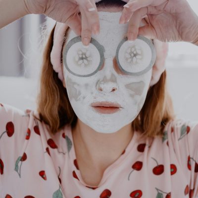 Woman Holding Skin Care Mask